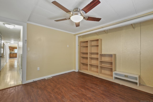 28 Nashua St, Norwich, CT 06360 - empty room featuring wood finished floors, ceiling fan, and ornamental molding
