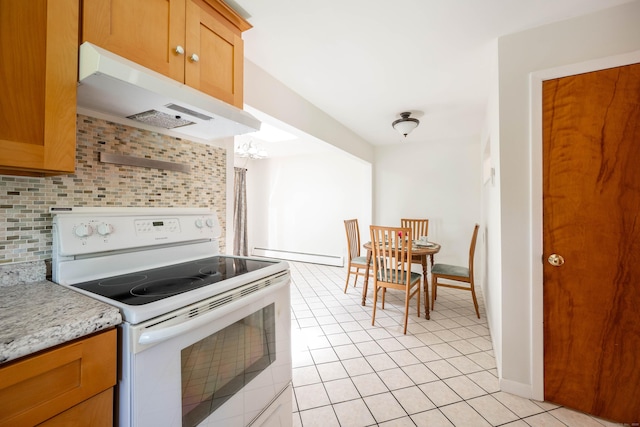 25 Old Middle Rd, Brookfield, CT 06804 - kitchen with electric range, under cabinet range hood, tasteful backsplash, light countertops, and light tile patterned floors