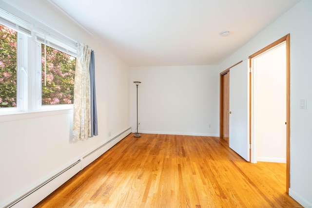 25 Old Middle Rd, Brookfield, CT 06804 - unfurnished bedroom featuring baseboard heating and light wood-style floors
