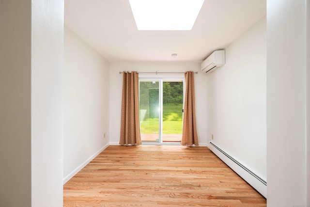 25 Old Middle Rd, Brookfield, CT 06804 - unfurnished room with a baseboard radiator, a wall mounted air conditioner, light wood finished floors, and a skylight