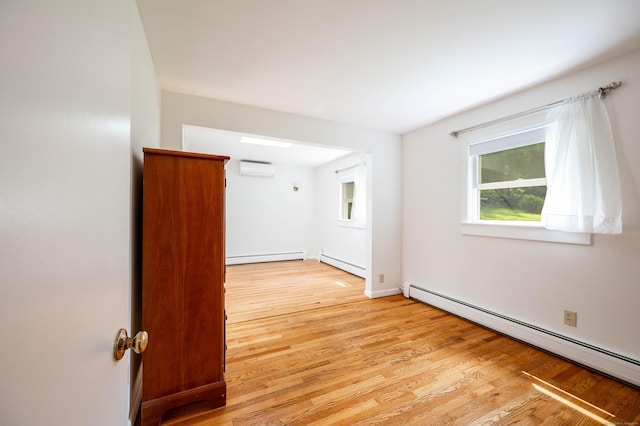 25 Old Middle Rd, Brookfield, CT 06804 - spare room featuring a baseboard radiator and light wood-style floors