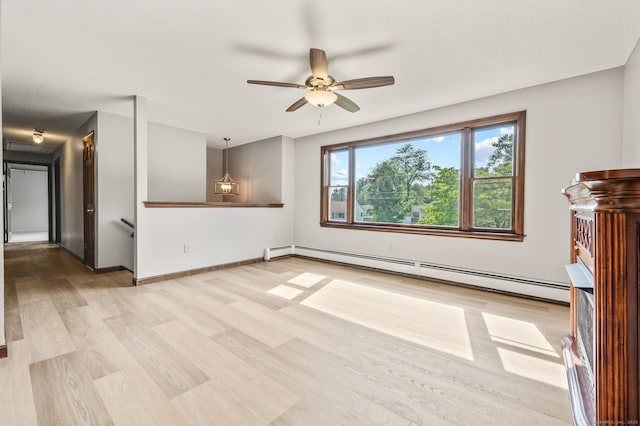 2 Hillyer Dr, Enfield, CT 06082 - unfurnished living room featuring a baseboard heating unit, light wood-style floors, and a ceiling fan