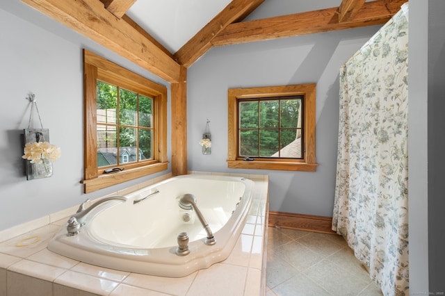 18 Sandpiper Ln, East Lyme, CT 06333 - bathroom featuring a whirlpool tub, lofted ceiling, and tile patterned flooring