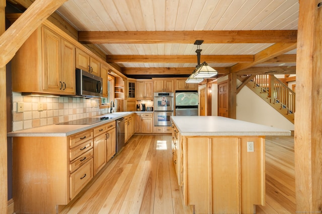 18 Sandpiper Ln, East Lyme, CT 06333 - kitchen featuring stainless steel appliances, light wood finished floors, a wooden ceiling with exposed beams, light countertops, and hanging light fixtures