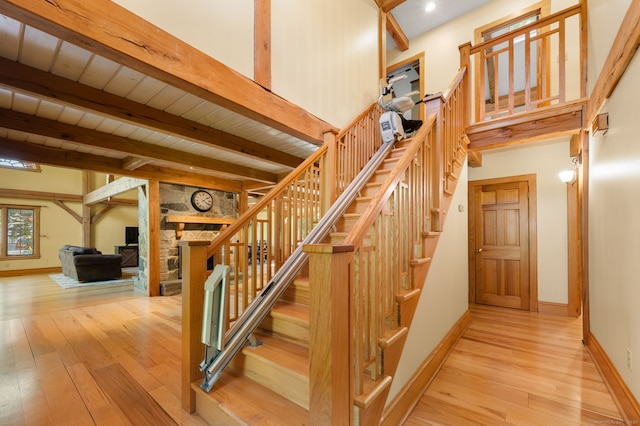 18 Sandpiper Ln, East Lyme, CT 06333 - stairway featuring wood-type flooring and beamed ceiling