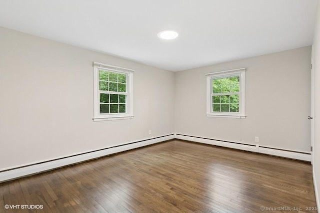6 Kingsbury Rd, Norwalk, CT 06851 - spare room with healthy amount of natural light, a baseboard radiator, wood finished floors, and a baseboard heating unit