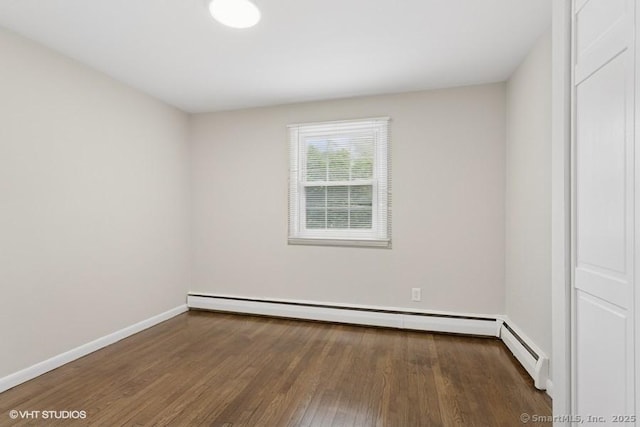 6 Kingsbury Rd, Norwalk, CT 06851 - empty room featuring wood finished floors and a baseboard heating unit