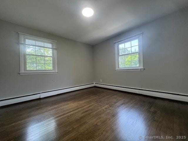 6 Kingsbury Rd, Norwalk, CT 06851 - empty room featuring wood finished floors and a baseboard radiator