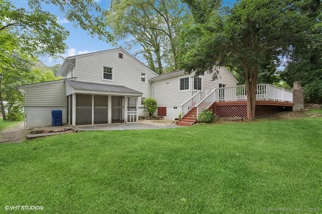 6 Kingsbury Rd, Norwalk, CT 06851 - rear view of property featuring a sunroom, a lawn, and a deck