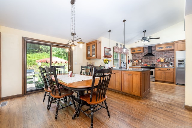 26 Skyview Ter, Bristol, CT 06010 - dining room with light wood finished floors, vaulted ceiling, and ceiling fan
