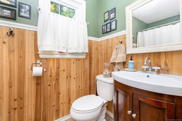 26 Skyview Ter, Bristol, CT 06010 - bathroom with vanity, wainscoting, wood walls, and a shower with curtain