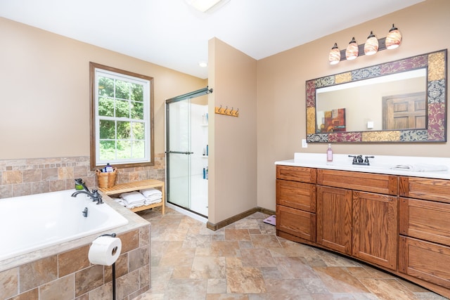 26 Skyview Ter, Bristol, CT 06010 - bathroom with vanity, a stall shower, a bath, and stone finish floors