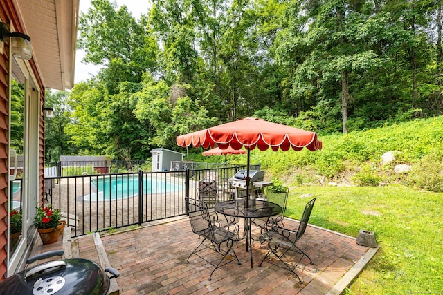 26 Skyview Ter, Bristol, CT 06010 - fenced backyard with a storage unit, a patio area, and outdoor dining space