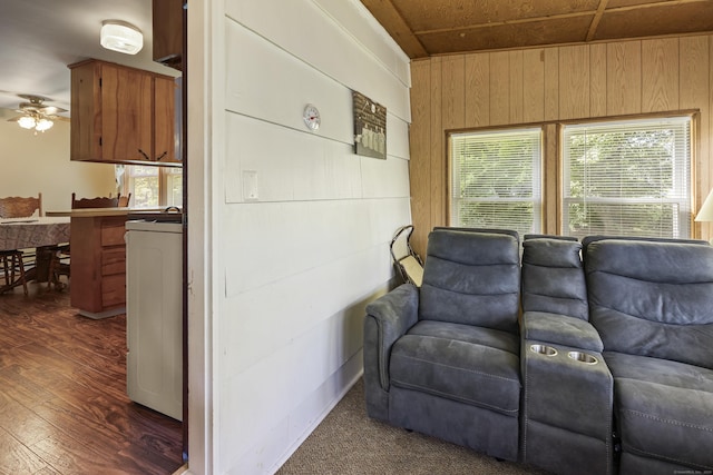 15 Denis Dr, Thompson, CT 06255 - living room featuring wood walls, dark wood-style flooring, ceiling fan, healthy amount of natural light, and washer / clothes dryer