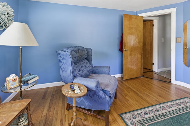 15 Denis Dr, Thompson, CT 06255 - living area featuring baseboards and wood finished floors