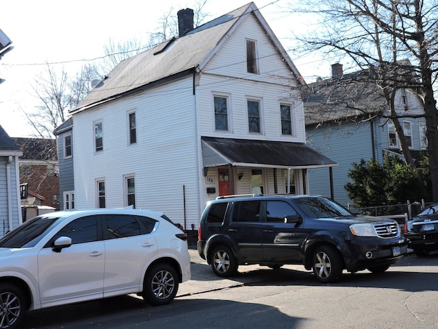 188 Hazel St, New Haven, CT 06511 - view of side of property featuring a chimney