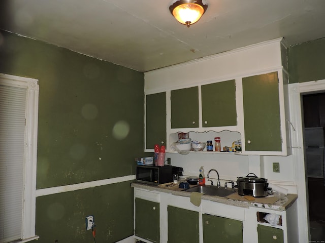 188 Hazel St, New Haven, CT 06511 - kitchen with black microwave and open shelves
