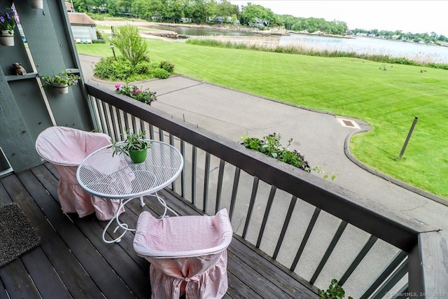 17 Harbour Vlg Unit F, Branford, CT 06405 - deck with a water view and a lawn