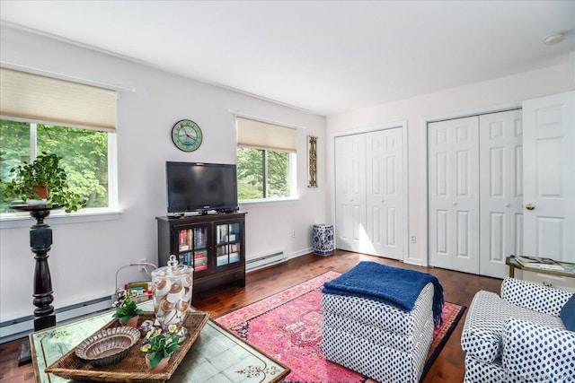 17 Harbour Vlg Unit F, Branford, CT 06405 - living area with a baseboard heating unit and wood finished floors