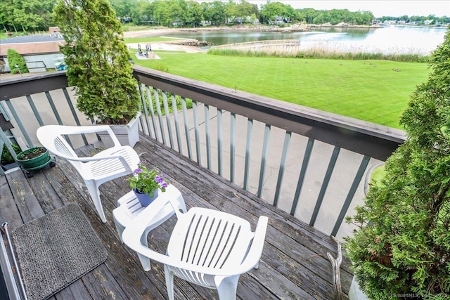 17 Harbour Vlg Unit F, Branford, CT 06405 - deck featuring a water view and a lawn