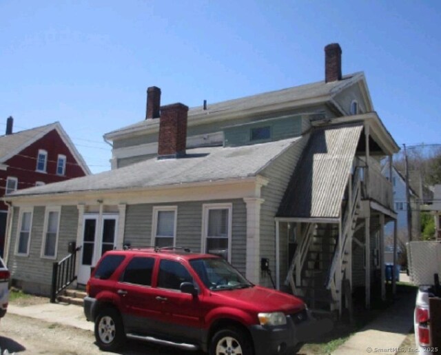 293 Central Ave, Norwich, CT 06360 - back of house with a chimney