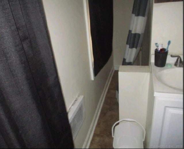 293 Central Ave, Norwich, CT 06360 - full bathroom with vanity, tile patterned floors, and a shower with curtain