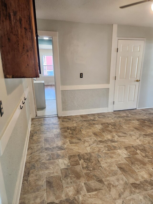 293 Central Ave, Norwich, CT 06360 - bathroom with baseboards and stone finish flooring