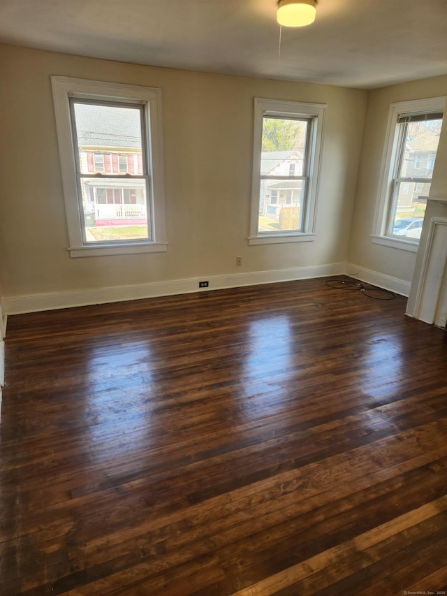 293 Central Ave, Norwich, CT 06360 - unfurnished room with healthy amount of natural light and dark wood finished floors