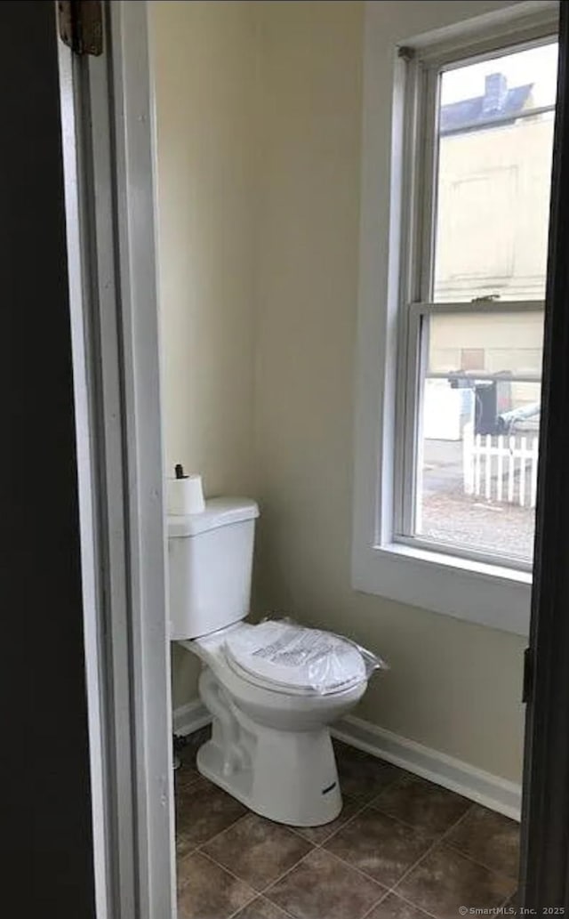 293 Central Ave, Norwich, CT 06360 - bathroom featuring toilet and tile patterned flooring