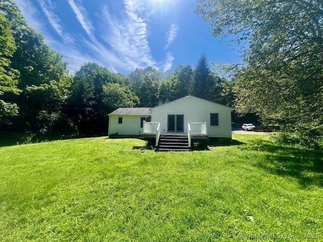 70 Watermelon Hill Rd, Carmel, NY 10541 - rear view of house featuring a deck and a lawn