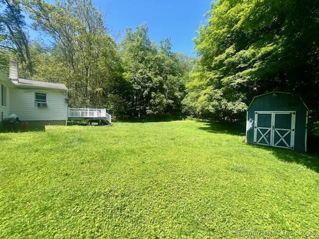 70 Watermelon Hill Rd, Carmel, NY 10541 - view of grassy yard with a shed and a wooden deck
