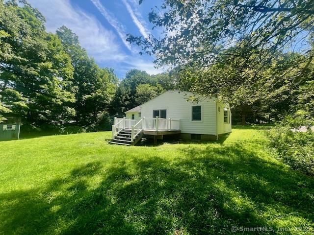 70 Watermelon Hill Rd, Carmel, NY 10541 - view of green lawn with a deck