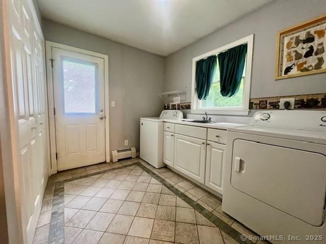 70 Watermelon Hill Rd, Carmel, NY 10541 - laundry room featuring a baseboard heating unit, cabinet space, inlaid floor details, light tile patterned floors, and independent washer and dryer