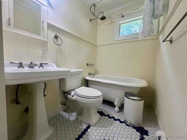 70 Watermelon Hill Rd, Carmel, NY 10541 - bathroom with a wainscoted wall, tile patterned floors, and tub / shower combination