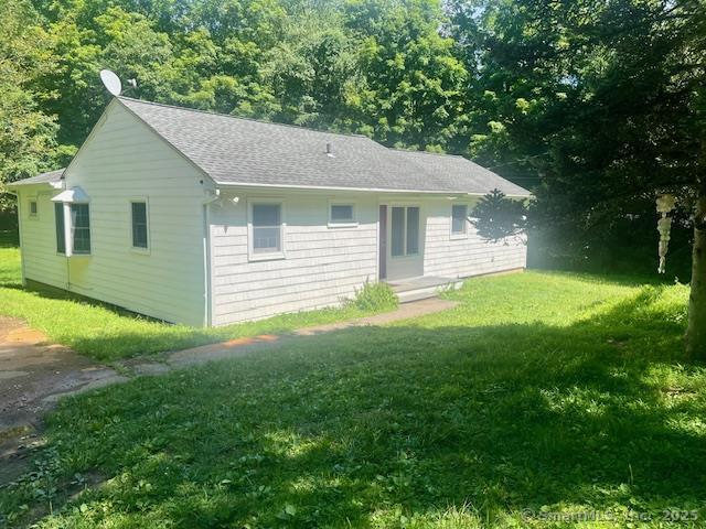 70 Watermelon Hill Rd, Carmel, NY 10541 - view of front of property with a front yard and a shingled roof