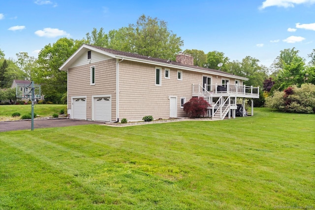 475 Pine Tree Dr, Orange, CT 06477 - rear view of property with asphalt driveway, stairs, a wooden deck, a chimney, and a garage
