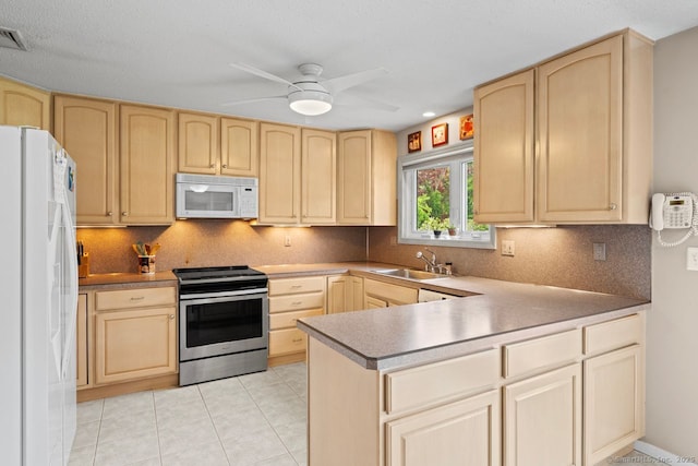475 Pine Tree Dr, Orange, CT 06477 - kitchen with white appliances, light brown cabinetry, a peninsula, and decorative backsplash