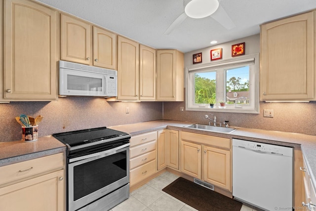 475 Pine Tree Dr, Orange, CT 06477 - kitchen featuring white appliances, light brown cabinetry, a ceiling fan, and backsplash