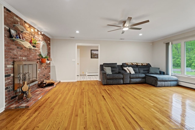 475 Pine Tree Dr, Orange, CT 06477 - living room featuring light wood-style floors, a ceiling fan, a fireplace, recessed lighting, and a baseboard heating unit