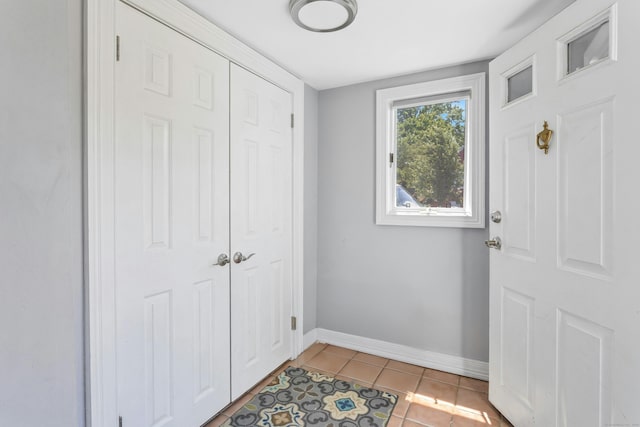 11 Margaret St, Norwalk, CT 06851 - foyer entrance with baseboards and light tile patterned floors