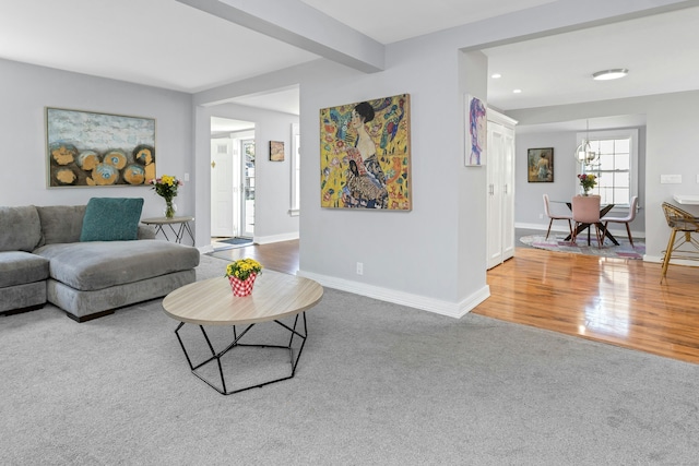 11 Margaret St, Norwalk, CT 06851 - living area with carpet floors, a chandelier, and recessed lighting