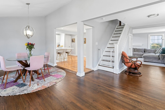 11 Margaret St, Norwalk, CT 06851 - dining area featuring wood finished floors, stairway, and a chandelier