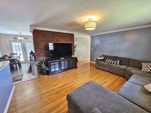 38 Sylvan Ave, Wallingford, CT 06492 - living area with a chandelier, wood finished floors, and crown molding
