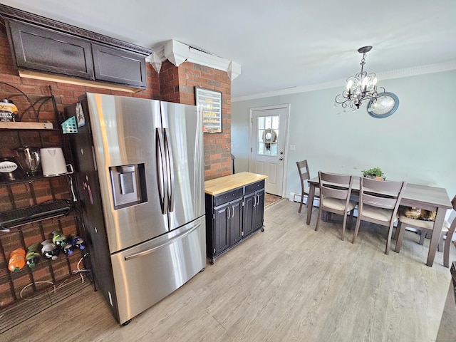38 Sylvan Ave, Wallingford, CT 06492 - kitchen with stainless steel fridge with ice dispenser, light wood-type flooring, ornamental molding, a chandelier, and light countertops