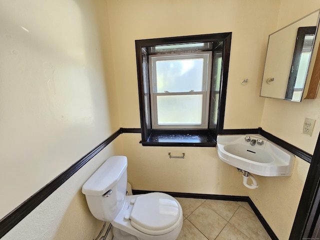 38 Sylvan Ave, Wallingford, CT 06492 - half bath with a sink and tile patterned floors