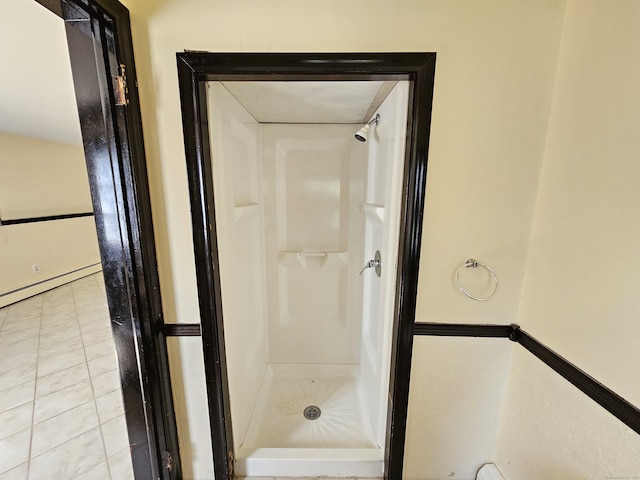 38 Sylvan Ave, Wallingford, CT 06492 - full bath with a stall shower, tile patterned floors, and a baseboard radiator