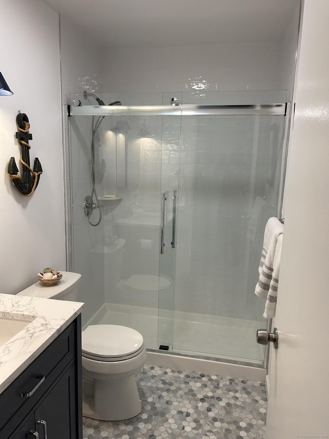 63 E Broadway Unit D, Milford, CT 06460 - full bathroom with vanity, a stall shower, and tile patterned flooring