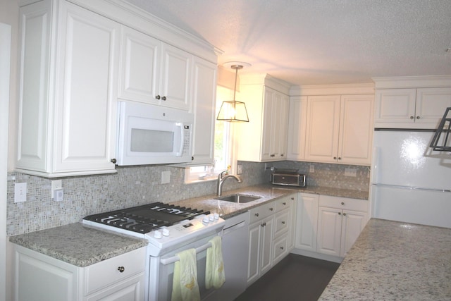 2337 Stanley St, New Britain, CT 06053 - kitchen with white appliances and white cabinets