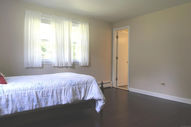 2337 Stanley St, New Britain, CT 06053 - bedroom with dark wood-style floors and baseboard heating