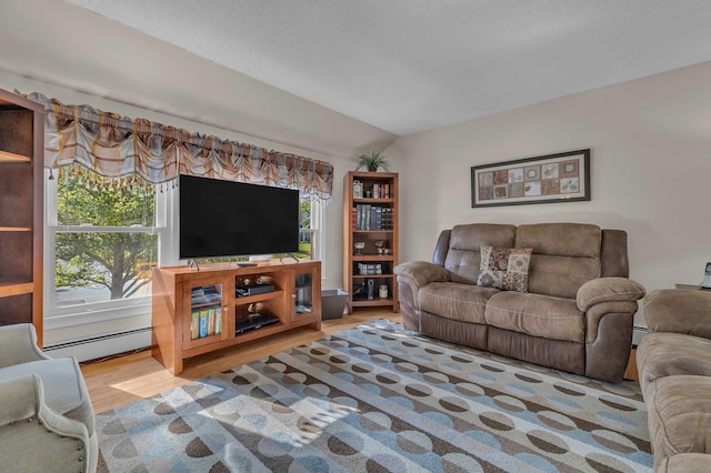 315 Judson Ave, Groton, CT 06355 - living room with baseboard heating and wood finished floors